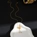 Tassel bow, zircon, small water droplets, titanium steel necklace, versatile for women, new trendy and niche design,_ipsvogv.com