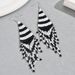 2024 New Japanese and Korean style minimalist beaded with niche tassel design, rice bead ear, versatile texture_ipsvogv.com
