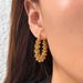 Spot Fashionable Niche Ins18k Gold Plated Titanium Steel Wave Horn Spring Earrings_ipsvogv.com