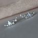 Cao Shi's earrings are copper plated with gold, shining with curved stars, versatile women's earrings_ipsvogv.com