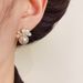 S Silver Needle Light Luxury Elegant White Lacquer Flower Pearl For Women Niche Fashion Design Versatile Earrings_ipsvogv.com