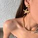 Fashionable Niche INS Titanium Vintage Large And Small Starfish Embossed Versatile Earrings_ipsvogv.com