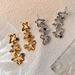 Light Luxury Zircon Silver Needle Gold Flower for Women's Fashion Design with Exaggerated High end and Internet_ipsvogv.com