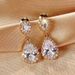 Cao Shi's Water Drop Geometric Design For Women's Banquet Dress, Paired With Jewelry, And Elegant Earrings_ipsvogv.com