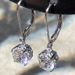 Cao Shi Live Classic Four Claw Zircon Female Copper Plated Platinum Earrings_ipsvogv.com