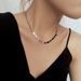 Small square snake bone necklace with minimalist and niche design, multiple square engraved letters, metal titanium_ipsvogv.com