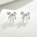 1 Pair Simple Style Bow Knot Inlay Copper Zircon Ear Studs_ipsvogv.com