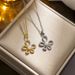Korean version minimalist flower necklace for women with a high-end sense of fashion, gold flower pearl pendant,_ipsvogv.com