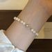 Unisex French retro new pearl geometric bracelet for women high end light luxury beads exquisite design niche bracelet_ipsvogv.com