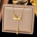 Titanium Steel Tassel Bow Necklace Women's Luxury Simple Advanced Versatile Lily Of The Valley Pendant Kwai_ipsvogv.com