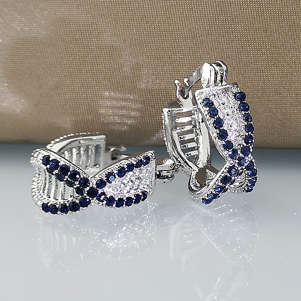 Cao Shi's Advanced Sense Treasure Blue Zircon Earrings with Korean Version Temperament and Personality Cross Hip Hop Style Earrings_ipsvogv.com
