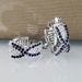 Cao Shi's Advanced Sense Treasure Blue Zircon Earrings with Korean Version Temperament and Personality Cross Hip Hop Style Earrings_ipsvogv.com