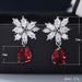 Cao Shimao's New Product Features Pear Shaped Red With Water Droplets Embedded. The Earrings Are Full Of Diamonds And_ipsvogv.com