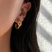 Fashionable Real Gold Electroplated INS Titanium Steel Knotted Fashion Niche Earrings_ipsvogv.com