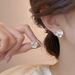 Light luxury simple high end niche camellia earrings for women ins trendy internet celebrities with cold wind earrings_ipsvogv.com