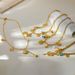 Niche Ins Style Stainless Steel Love Flower Tassel Necklace Fashionable Simple Exquisite Gold Plated Sweater Chain Female_ipsvogv.com