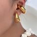 Fashionable Niche INS Retro Titanium Steel Hollow Smooth Tear Big Earrings_ipsvogv.com