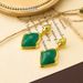 Vintage jewelry, water droplet arrow shaped green jelly glass light luxury, niche high-end earrings, autumn and winter_ipsvogv.com