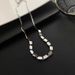 Small square snake bone necklace with minimalist and niche design, multiple square engraved letters, metal titanium_ipsvogv.com