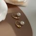 Circular Twisted Wire C-shaped With 2023 New Trendy And Non Fading Titanium Steel Wind Pearl Earrings_ipsvogv.com