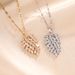 Titanium Steel Necklace, Female Copper Inlaid Zircon Pendant, Feather Leaf, Collarbone Chain, Love Wing Accessory_ipsvogv.com