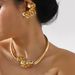 E13047 delicate high-end floral earrings, fashionable and versatile metal style symmetrical earrings_ipsvogv.com