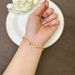 Vietnamese Sand Gold Light Luxury Style Diamond Inlaid Four Leaf Flower Tassel Round Bead Bracelet For Female Niche,_ipsvogv.com