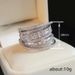 Cao Shi's Multi-layered Ring Is A Unique Niche Accessory For Women, Featuring Fashionable And Shiny Zircon Design_ipsvogv.com