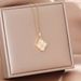 New High-end Italian Brushed Hollow Four Leaf Clover Necklace, Women's Gold-plated Pendant, Titanium Steel Lock Chain_ipsvogv.com