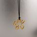 Spot INS Gold Plated Titanium Steel Retro Geometric Hollow Camellia Flower Black Leather Rope Necklace_ipsvogv.com