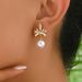 Unique women's with versatile high-end design featuring coconut leaves, diamond studded string, pearl earr, and_ipsvogv.com