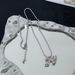 Autumn New Korean Silver-Plated Matte Silver Ribbon Bowknot Dynamic Pearl Necklace Sweater Chain For Women With High-End_ipsvogv.com