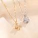 the Same Type Of Four Leaf Windmill Rotary Pendant Titanium Steel Lock Bone Chain Versatile Non Fading Necklace_ipsvogv.com