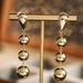 Gold-Plated Copper Minimalist Style Three Glossy Ball Tassel Earrings High-End Creative Round Bead Ear Cuffs For Women_ipsvogv.com