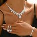 Trendy Gold And Silver Fashion Crystal Loose Diamond Necklace Earrings Bracelet Set Three Pieces_ipsvogv.com