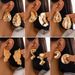 Cold Wind Liquid Metal Droplet Fashion Design Irregular Twist Earrings_ipsvogv.com