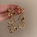 Light Luxury Zircon Silver Needle Gold Flower for Women's Fashion Design with Exaggerated High end and Internet_ipsvogv.com