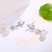 Cao Shi Synthetic Mother Shell Pearl Earrings Elegant and Exquisite Wave Pattern Earrings for Women's Long and Simple Earrings_ipsvogv.com