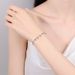 New Deyi Pure Silver Mosang Stone Plated With PT950 Gold Light Luxury Tassel Four Claw Bracelet Daily Elegance_ipsvogv.com