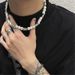 New hip-hop niche design with thorny patchwork pearl collarbone chain, versatile sweater hoodie chain for men and women,_ipsvogv.com