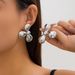 Jewelry Fashion Metal Flower Spiral For Women Simple And Irregular Texture Wings Earrings_ipsvogv.com