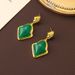 Vintage jewelry, water droplet arrow shaped green jelly glass light luxury, niche high-end earrings, autumn and winter_ipsvogv.com