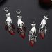 Gothic dark blood drop heart palm earrings female ins style creative design water drop ruby hand earrings_ipsvogv.com