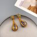 trendy water drop carved enamel Chinese a sense of luxury, niche, and high-end. Light luxury ancient style earrings with_ipsvogv.com