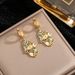 New All-in-one Titanium Steel Leopard Print Oil Drop Process Blue Eye Hollow Earrings For Women, Stainless Steel, Non_ipsvogv.com