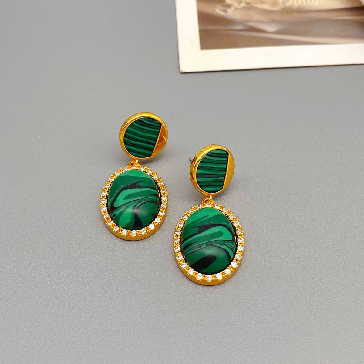Exaggerated luxurious peacock stone a high-end and super flashy design, niche earrings with silver needles_ipsvogv.com
