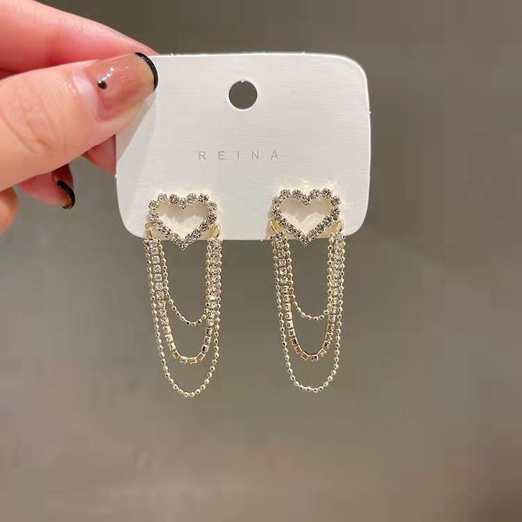 Hollow heart super fairy earrings for women niche high end earrings light luxury earrings tassel retro earrings_ipsvogv.com