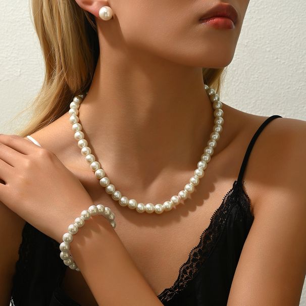 Ins niche light luxury high-end necklace earring set versatile with inlaid pearl design bracelet simple collarbone chain_ipsvogv.com