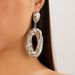 Personalized Metal Geometric Texture Hollow Female Irregular Twisted Smooth Earrings_ipsvogv.com