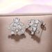 Cao Shi is obviously the same gorgeous fireworks earrings, sweet temperament, geometric zircon earrings, thin and fashionable female earrings_ipsvogv.com